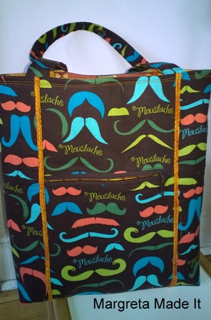 Tote bag - in brown and mustache fabric. Open top, piped with gold batik fabric.
